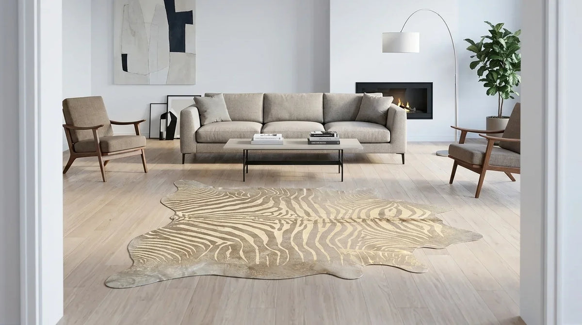 Beige and Grey cowhide rug on hardwood floor in contemporary european living room