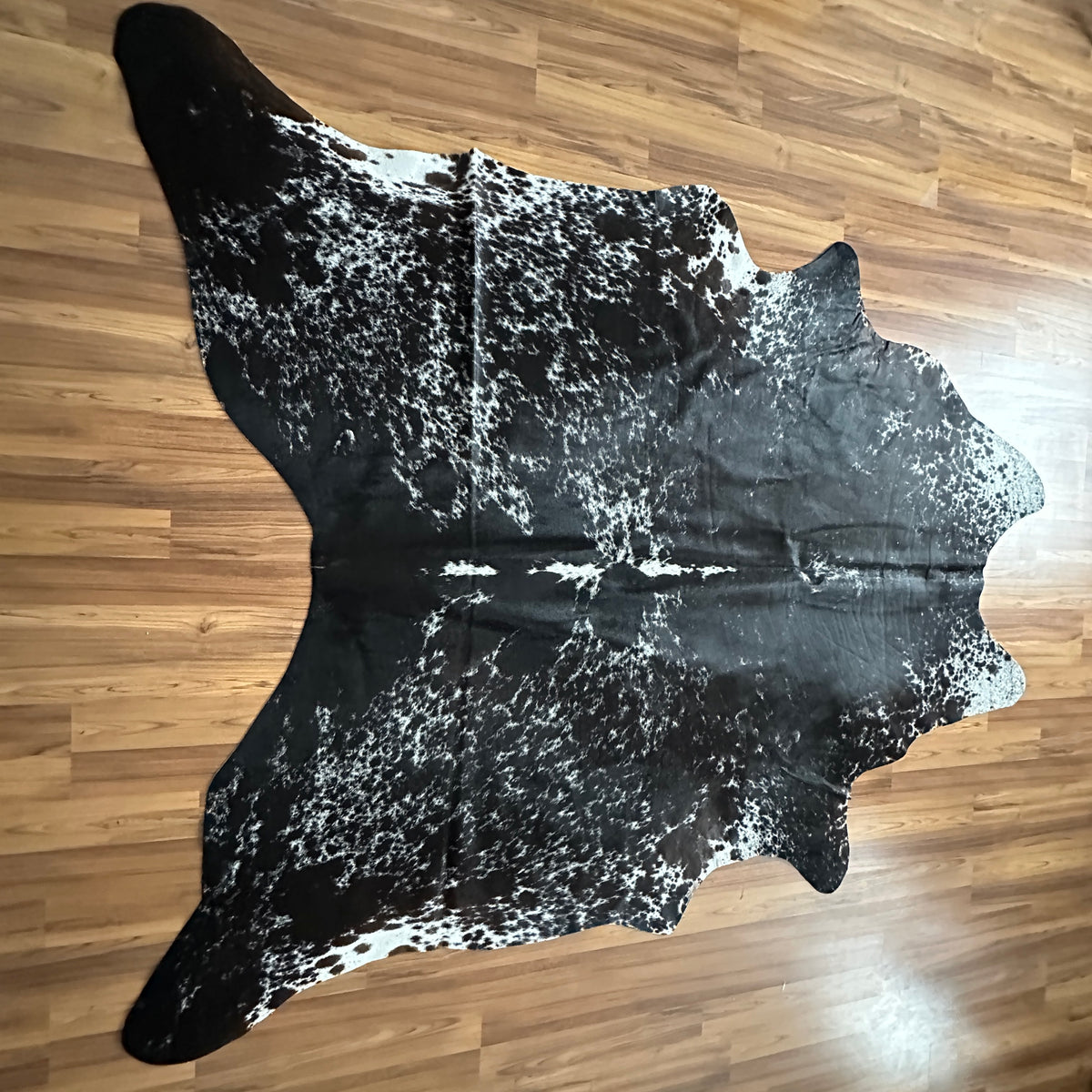 Black and White exotic cowhide rug, full overhead view