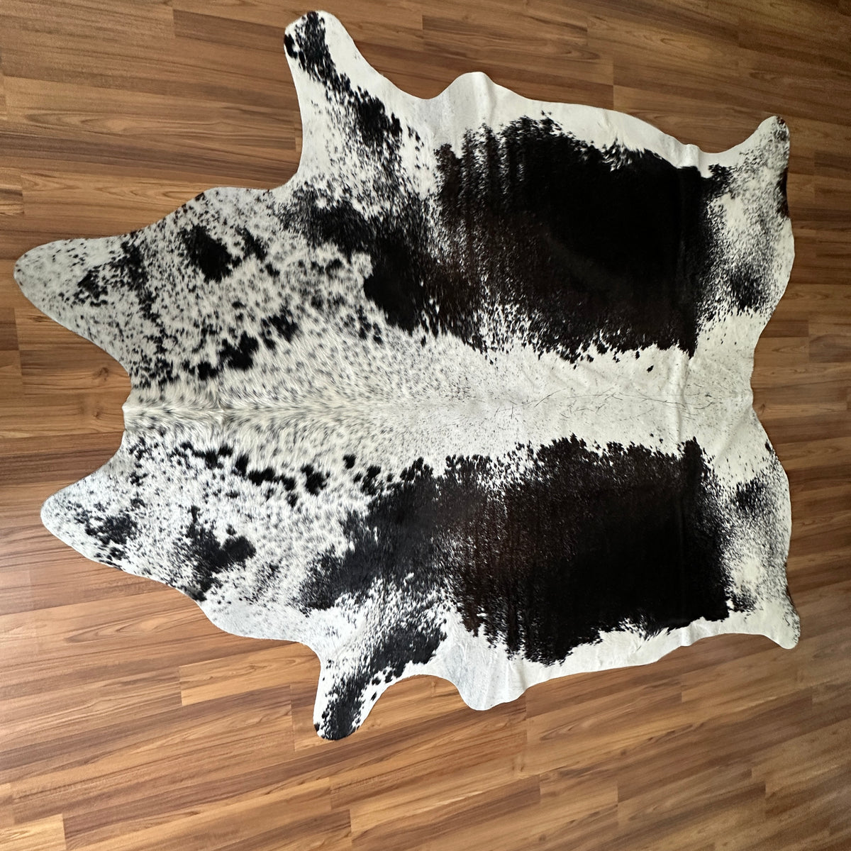 Black and White cowhide rug, full overhead view