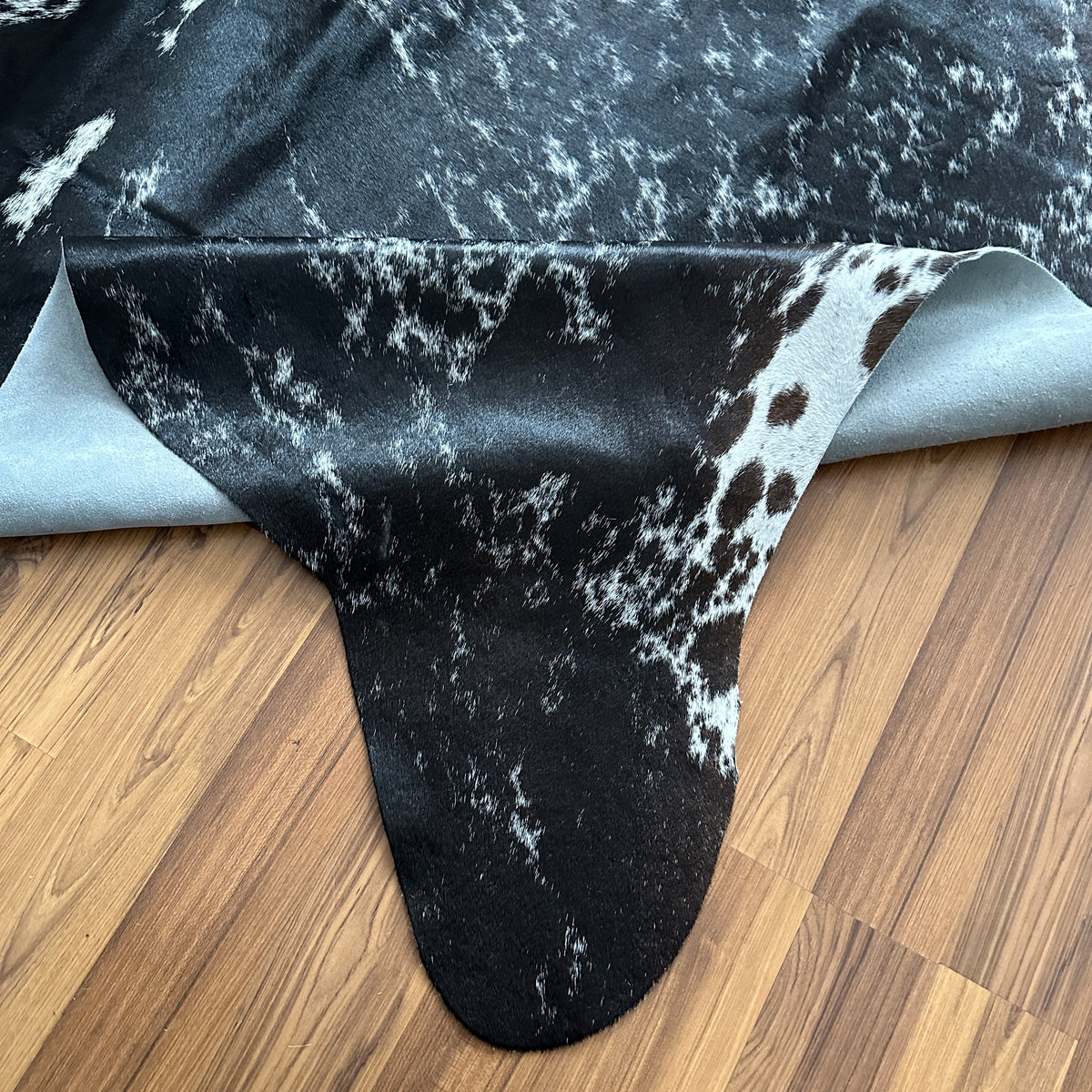 Close-up texture of Black and White exotic cowhide rug