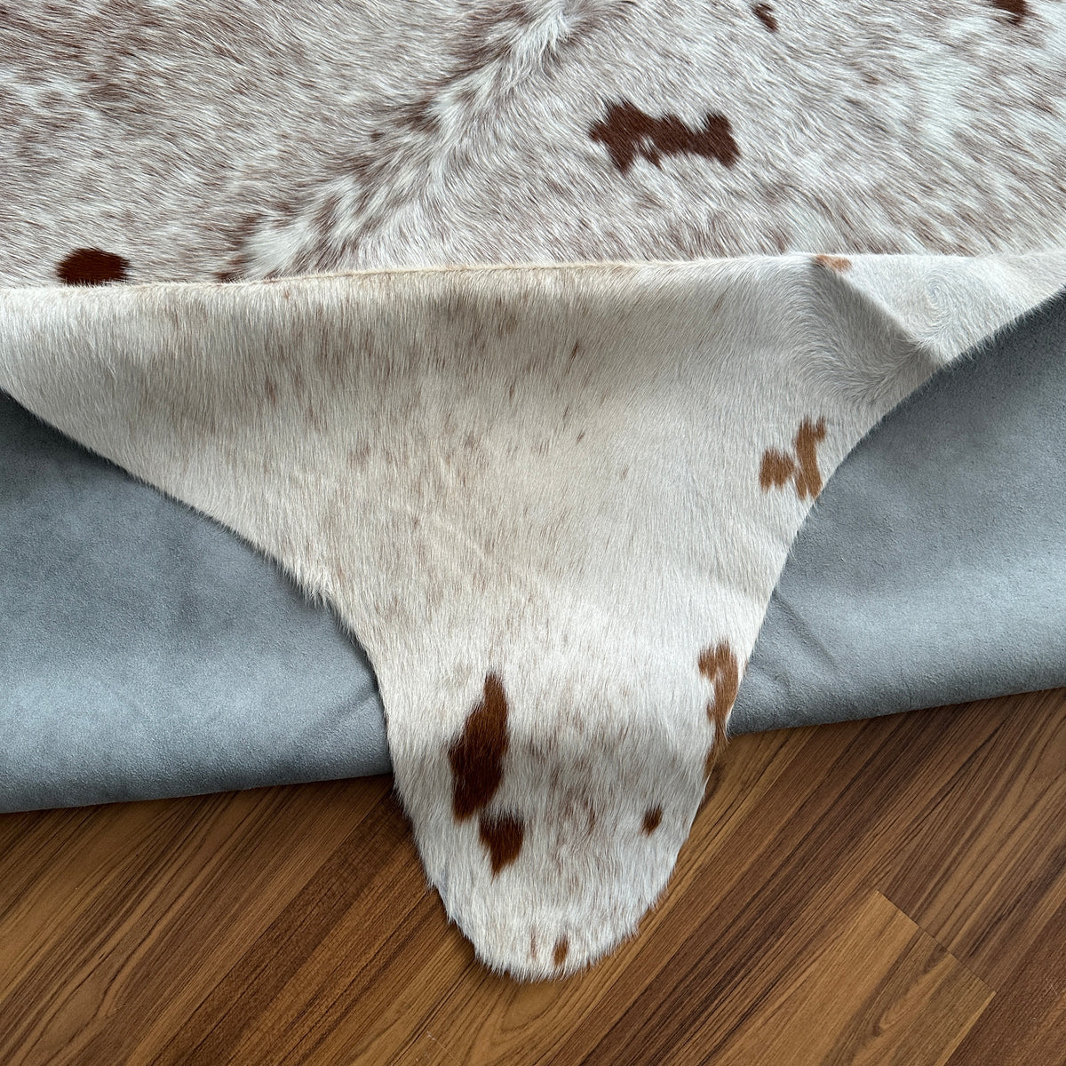 Close-up texture of Brown and White cowhide rug
