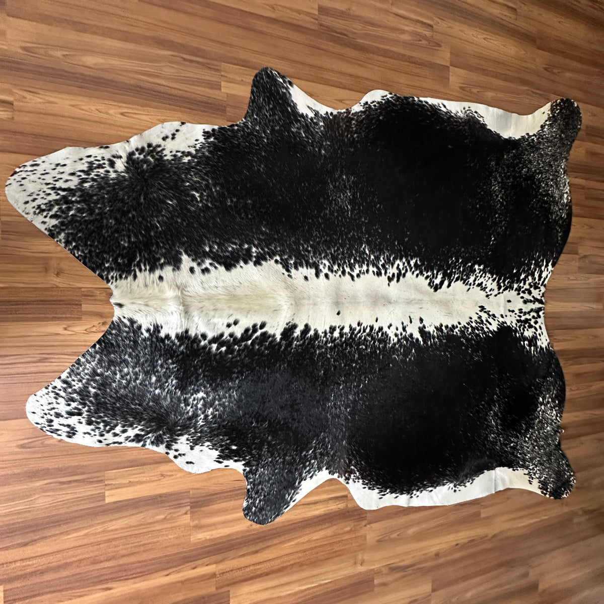 Black and White cowhide rug, full overhead view
