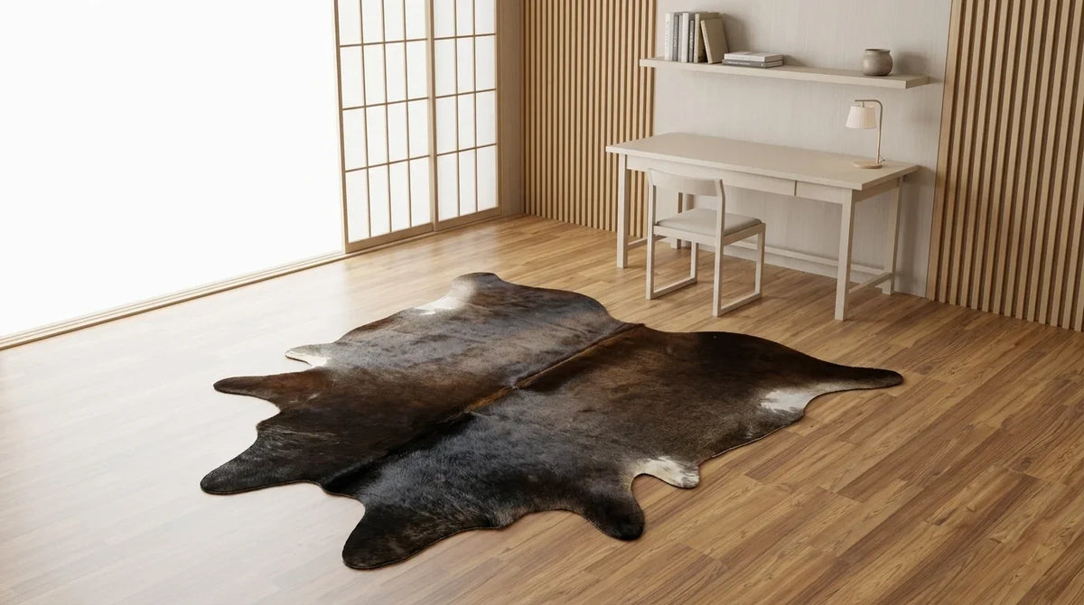 Black and White cowhide rug under desk in tokyo minimal home office