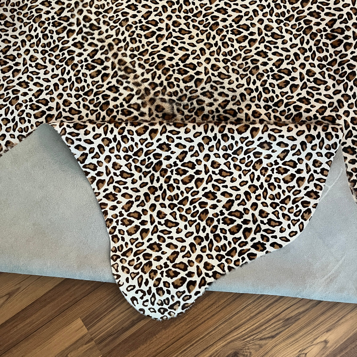 Close-up texture of Black and White salt and pepper cowhide rug — Fine even speckle of dark and light hairs throughout, peppe