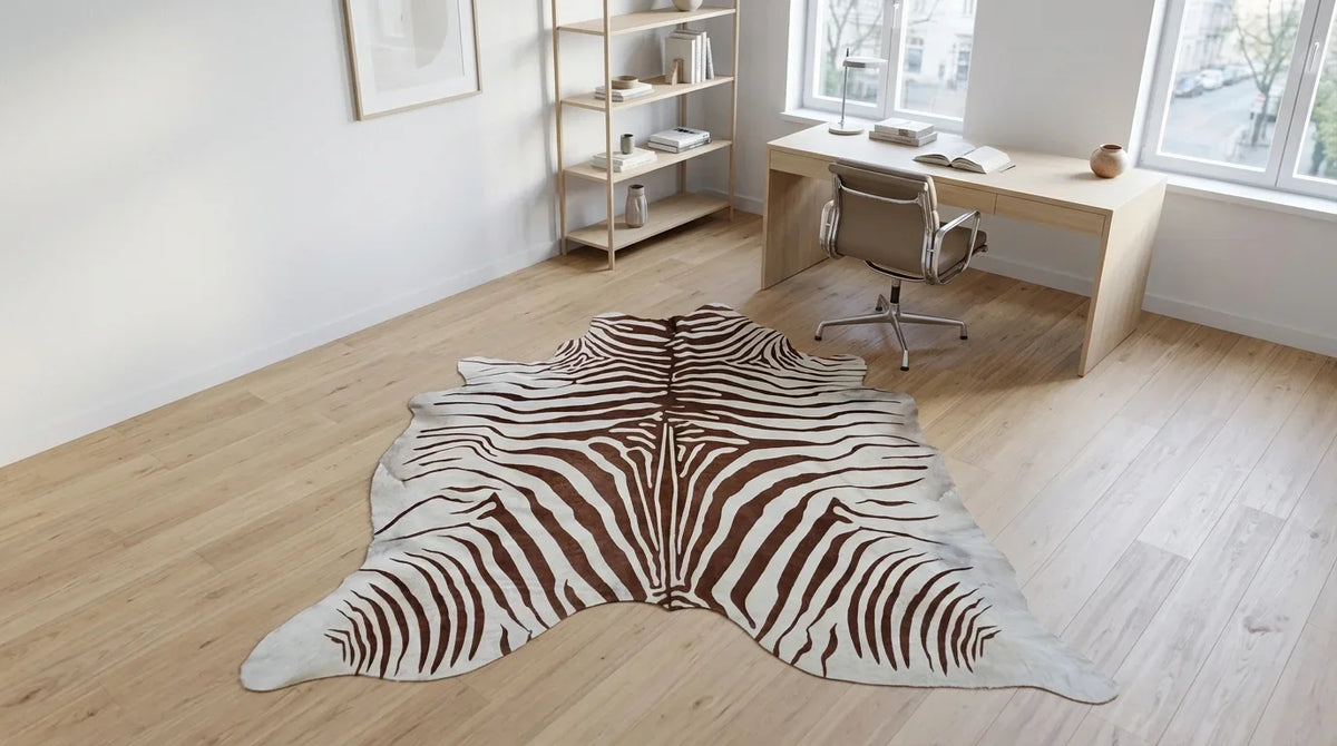 Brown and White cowhide rug under desk in contemporary european home office