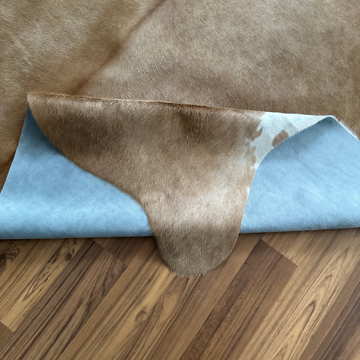 Close-up texture of Brown and White cowhide rug