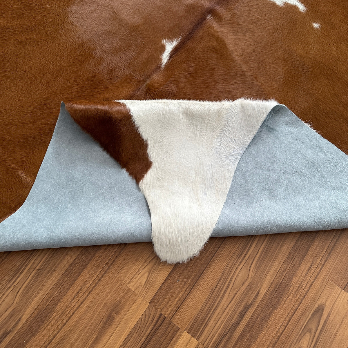 Close-up texture of Brown and White cowhide rug