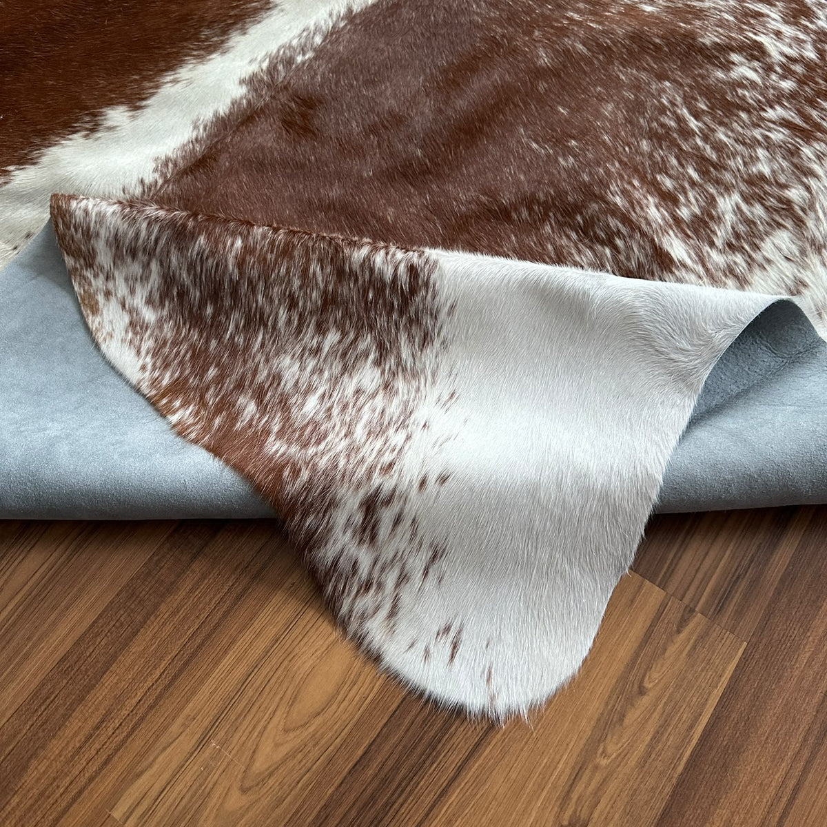 Close-up texture of Brown and White cowhide rug